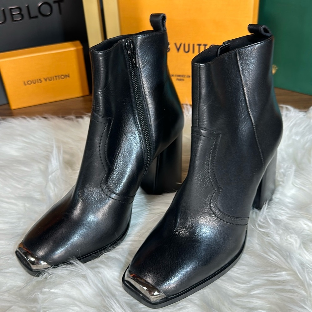 Steve Madden Black Ankle Boots with Silver Accents